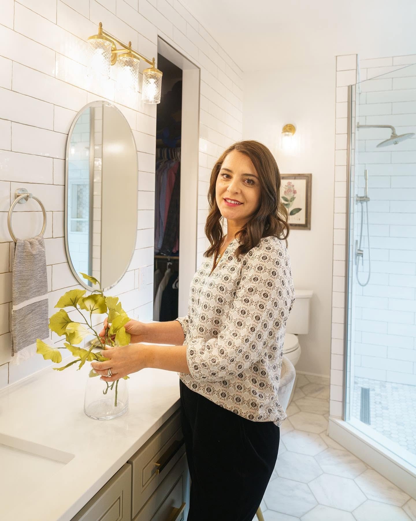 Monika adding the final touches in the finished bathroom